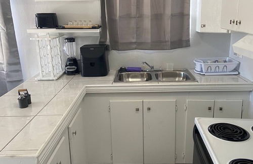 Nassau Apartment | TheRedDoor@ShermanAve near Downtown Nassau