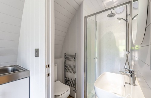 Pooley Bridge Cottage | These stunning Pods offer guest comfortable accommodation, a 5ft fixed bed, shower room and a spacio