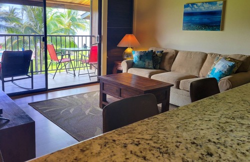 Kaunakakai House | Third-floor condo with ocean views, WiFi, pool, grills & washer/dryer