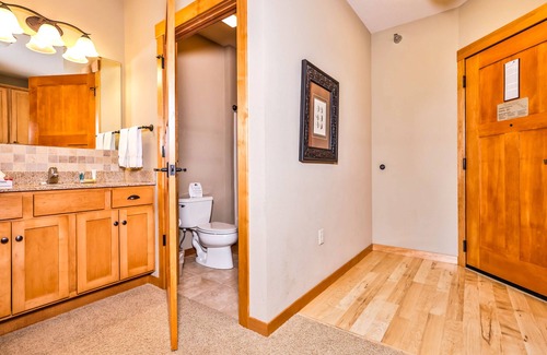 Three Lakes Condo | Third-floor studio with lake view, kitchenette, balcony, hot tubs, pool, & gym