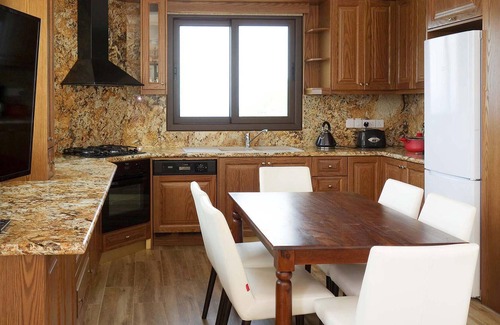 Pachyammos House | This attractive stone villa is set in an elevated position and commands wonderful views across the c