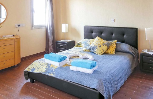 Pomos House | This attractive stone villa is set in an elevated position and commands wonderful views out across t