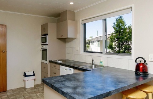 Taupo Cottage | This Bach Has it All - Rainbow Point Holiday Home