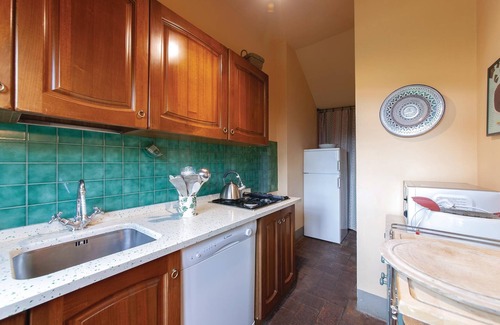 Toiano House | This characteristic barn has been completely renovated and divided into two apartments.
