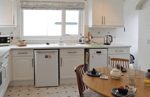 Wigton Cottage | This charming cottage is situated just 50 yards away from the beach, and enjoys beautiful views.