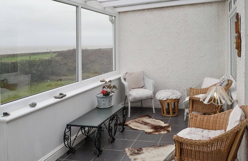 Wigton Cottage | This charming cottage is situated just 50 yards away from the beach, and enjoys beautiful views.