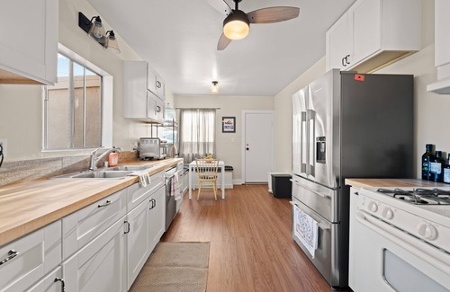 Ventura House | This charming two-bedroom, one-bath duplex is your ideal coastal retreat, offering an authentic beach town experience just a short distance from the water.