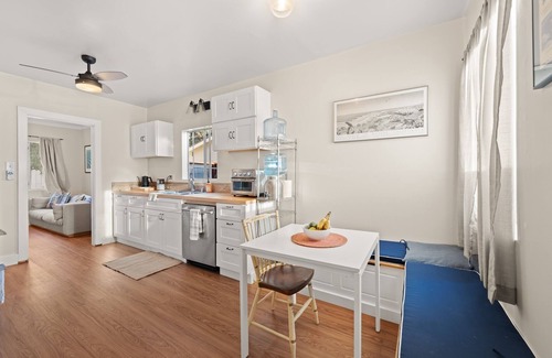Ventura House | This charming two-bedroom, one-bath duplex is your ideal coastal retreat, offering an authentic beach town experience just a short distance from the water.