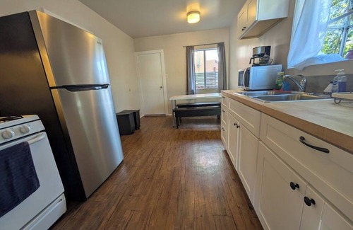 Ventura House | This charming two-bedroom, one-bath duplex is your ideal coastal retreat, offering an authentic beach town experience just a short distance from the water.