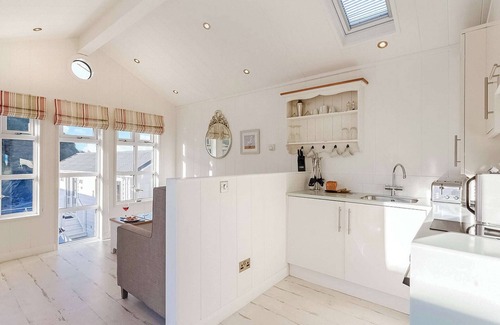 Hele Ski Chalet | This chic country style beach hut is ideal for a romantic escape by the sea.