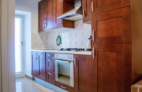 Gondolici Apartment | This functionally furnished apartment is located on a hill with a beautiful view of the sea and the