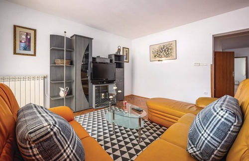 Rogocana House | This Mediterranean vacation home with pool and beautifully landscaped garden is located in a settlem