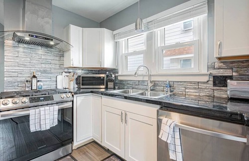 Akron House | This vintage home in Akron provides easy access to nearby cities & attractions.