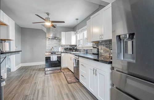 Akron House | This vintage home in Akron provides easy access to nearby cities & attractions.