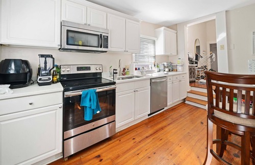 South of Broad Apartment | Three Bedroom Apartment in Historic District With Parking!