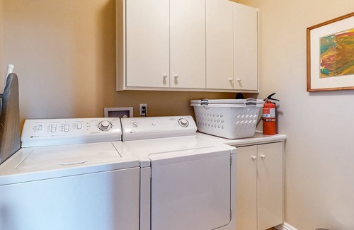 Blue Jay House | Three-story home with fireplace, central AC, game room & lake view dog-friendly