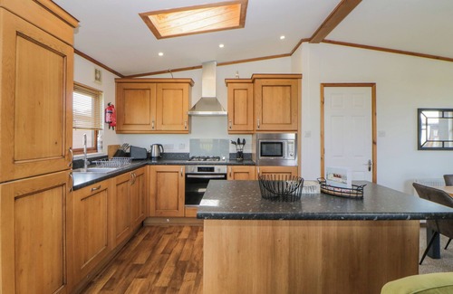 Saint John Cottage | THREE VIEWS LODGE, family friendly, with pool in Whitsand Bay