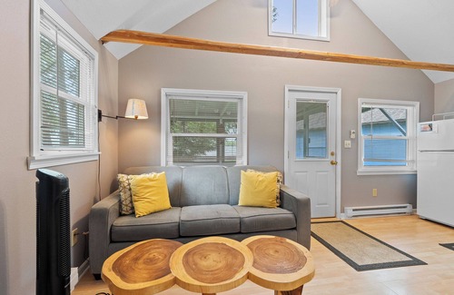 Baileys Harbor Cabin | Tiger Lily Cabin on Kangaroo Lake- Dog Friendly, playground, fire pit