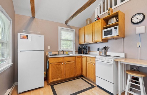 Baileys Harbor Cabin | Tiger Lily Cabin on Kangaroo Lake- Dog Friendly, playground, fire pit