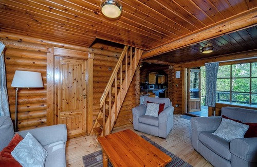 Westleigh Ski Chalet | Timber lodge set in an elevated position with views of the lake.