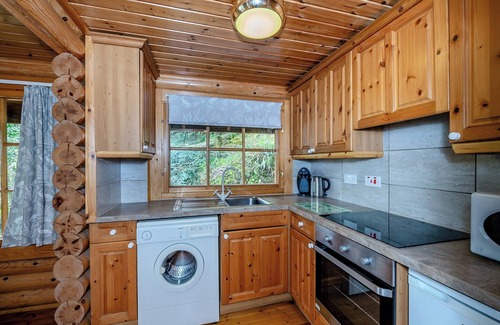 Westleigh Ski Chalet | Timber lodge set in an elevated position with views of the lake.