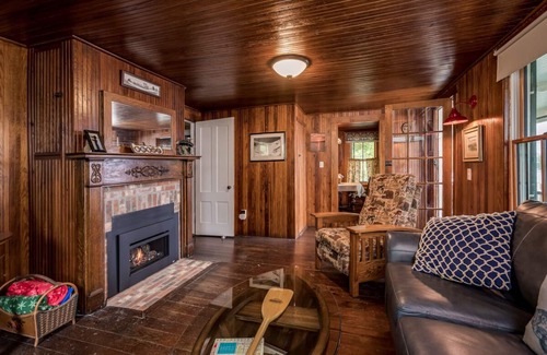 Melvin Village House | Timeless lakefront home on Lake Winnipesaukee with screened-in porch and dock