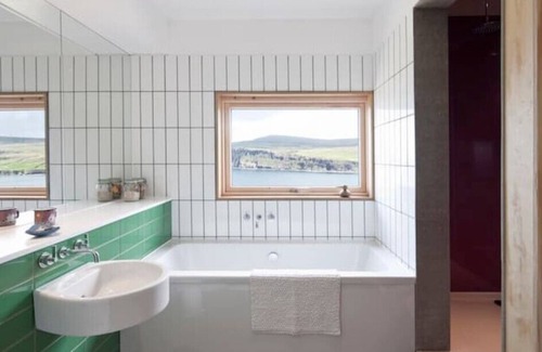 Waternish Cottage | Tinhouse - A Unique Cottage Overlooking the Dramatic Seascape of North West Skye