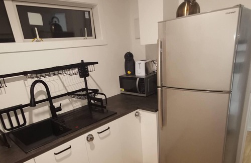 Tryphena House | Tiny Home only minutes from the pub, cafe and beach