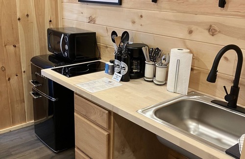 Grand Junction House | Tiny home with one queen bed on main floor.