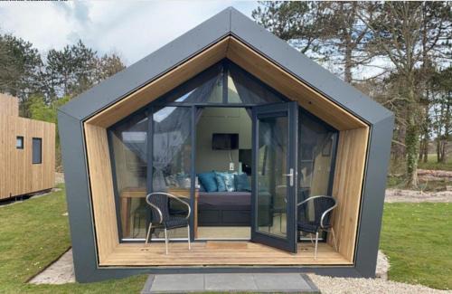 Callantsoog House | Tiny House in het groen, aan zee met privé Hottub