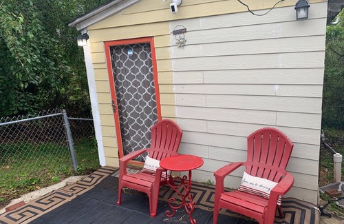 Atlanta House | Tinyhouse, Enchanted Cottage nestled in the backyard of the fenced in property.