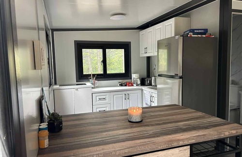 Hampden Ski Chalet | To the container