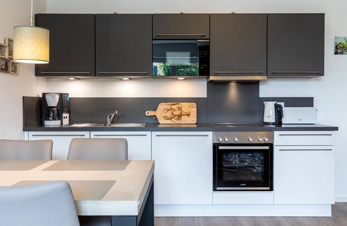 Boltenhagen Apartment | Tolles Ferienapartment Nahe der Ostsee mit Terrasse, Spielplatz und Saunabereich - Aparthotel