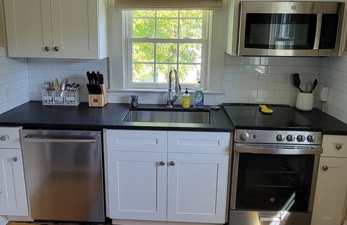 Morganton Apartment | Top Deck- Upscale Downtown 2 BR w/private fenced yard & garage parking