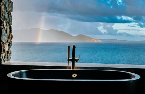 East End Apartment | Top‑Level Sunrise Oceanview Suite, Private Balcony