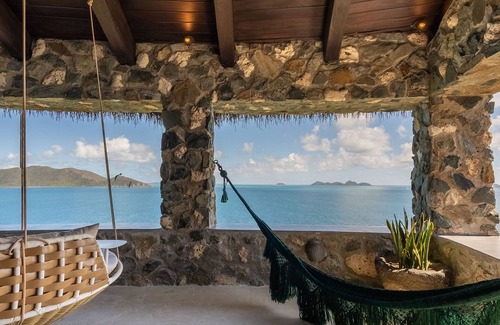 East End Apartment | Top‑Level Sunrise Oceanview Suite, Private Balcony