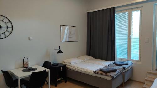 Jyvaskyla Apartment | Top location city center studio with balcony and free parking Kotimaailma Apartments