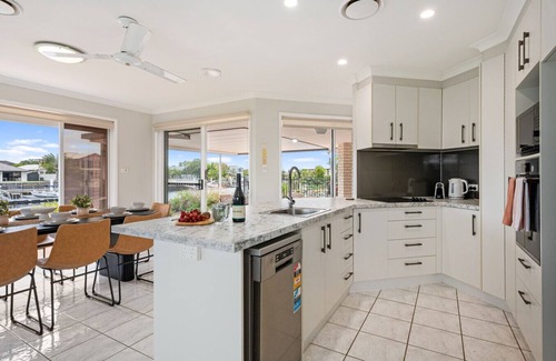 Banksia Beach Apartment | Topsail Tides Waterfront with Solar-Heated Pool and Canal Views