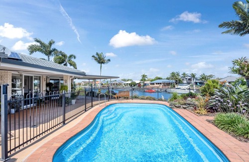 Banksia Beach Apartment | Topsail Tides Waterfront with Solar-Heated Pool and Canal Views