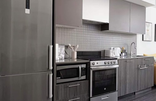 Garden District Apartment | Toronto skyline suites