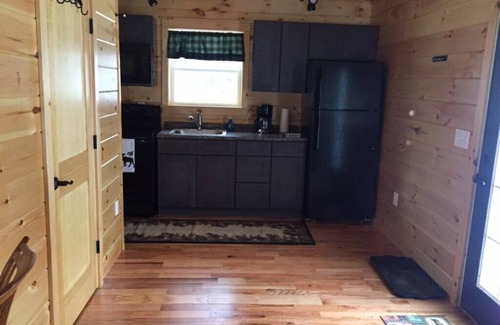 Errol House | Townhouse- direct access to snowmobile trails. Available for seasonal rental.