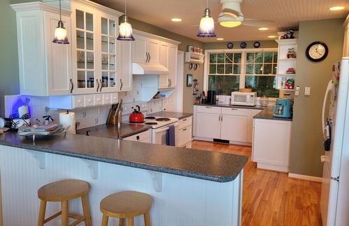 Frankfort House | Trader Scott's - GORGEOUS LAKEFRONT HOME WITH PRIVATE DOCK AND BONFIRE RING!