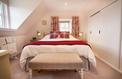 Golspie Cottage | Traditional Highland semi-detached old stone cottage