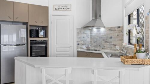 Banksia Beach House | Tranquil Canal Front Holiday House