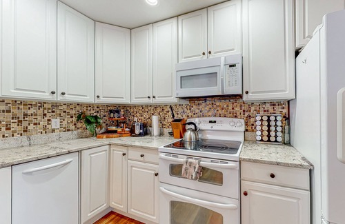 Piedmont House | Tranquil house with fireplace, hot tub, foosball table, jetted tub, & patio