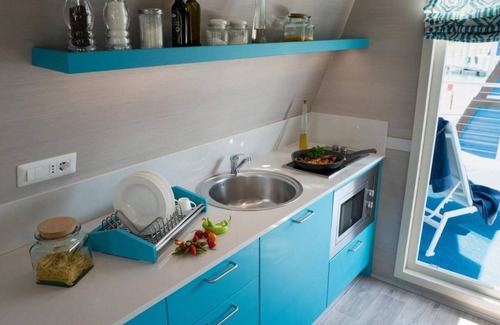 Lignano Sabbiadoro Boat Rental | Tranquil Marina Azzurra Resort House boat 2BR sleeps 6
