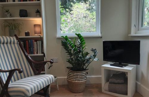 Goldsithney House | Tranquil wood cabin set in a beautiful orchard