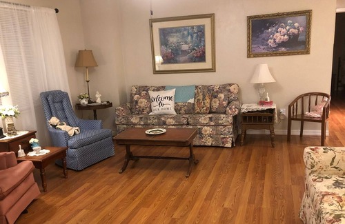 Mount Dora House | Transport yourself in time to a tastefully decorated chic Parisian Mt Dora home.