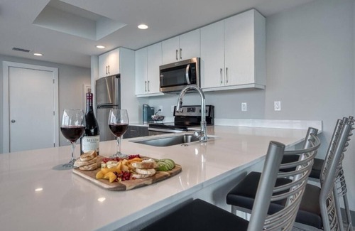 Treasure Island Hotel | Treasure Island Comfort: Parking, Pool, Beach Shuttle | Full Kitchen | 2 Units