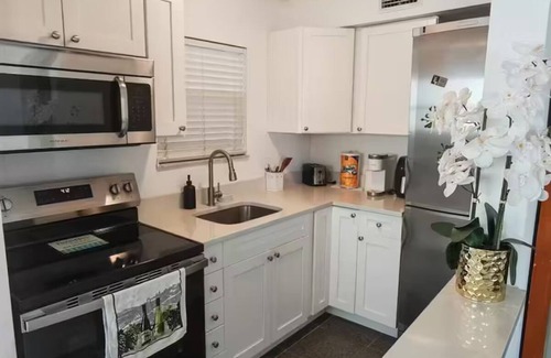 Capri Isle Apartment | Treasure Island Waterfront Oasis Minutes to Beach Dock Sunsets at John’s Pass